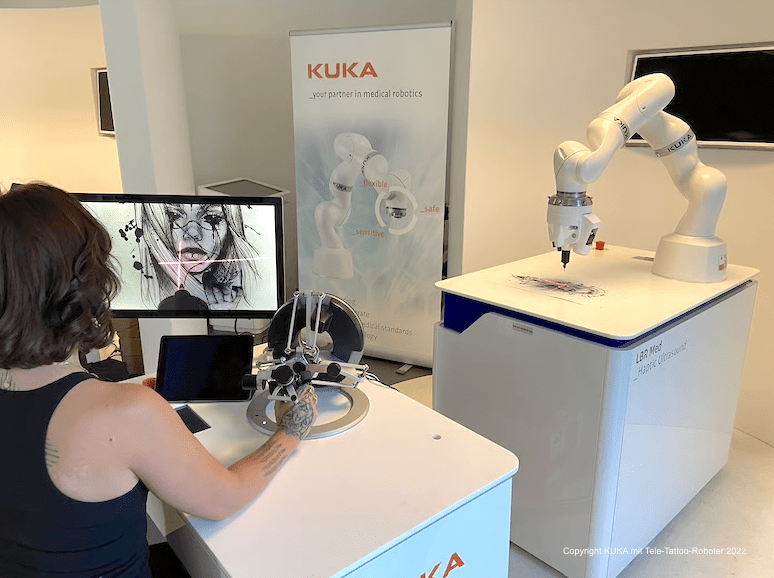 KUKA mit Tele-Tattoo-Roboter auf der Digital X in Köln mit Fauve Lex Copyright 2022